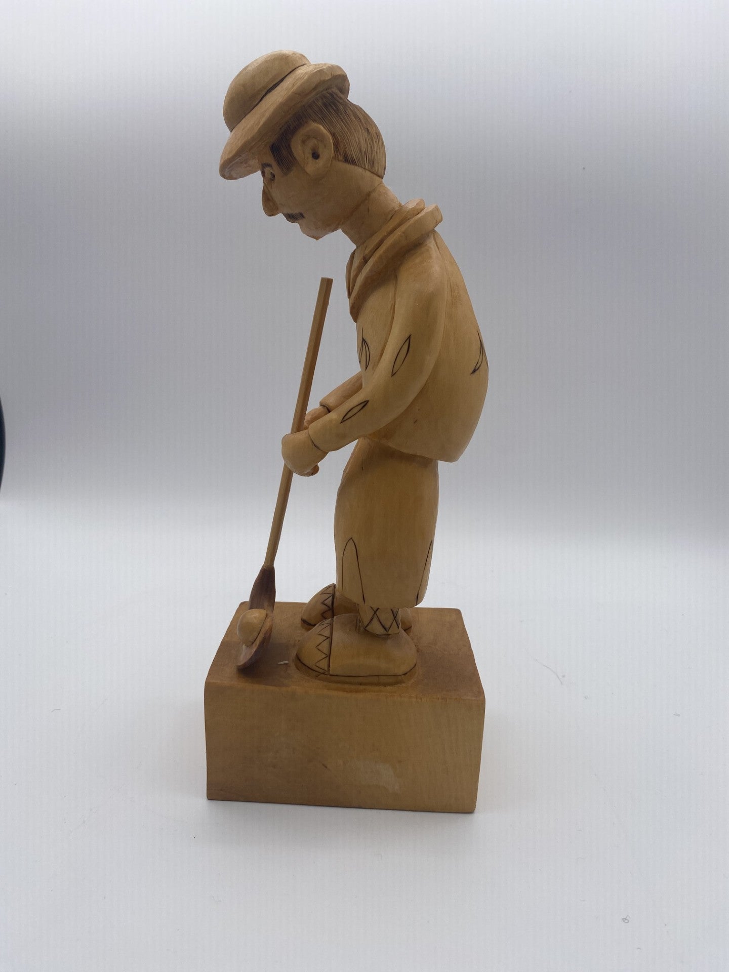 Homme golfeur